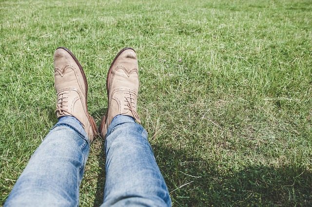 relaxing on green lawn Perth