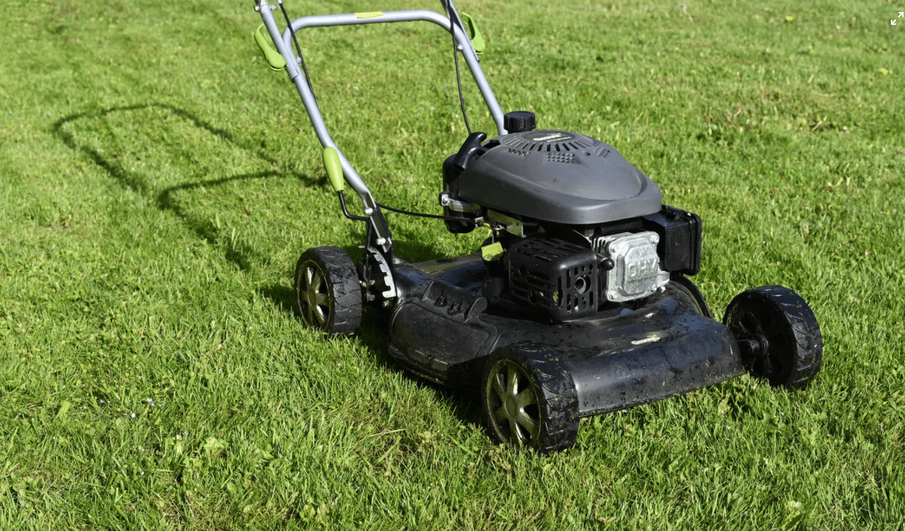 lawn mower on green grass lawn mowing tips